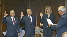 Trustees receiving the oath of office